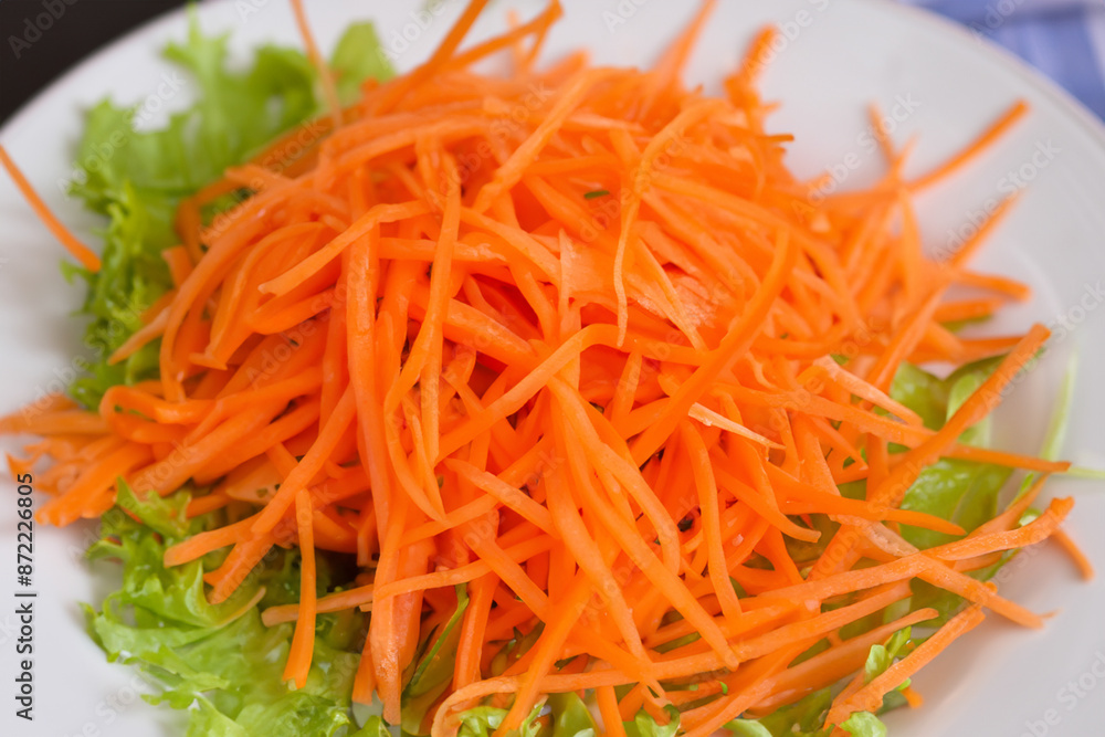A plate of greens, carrots, and straws. Orange healthy salad concept. A plate of greens, carrots, greens and white straws. A plate of greens, carrots, greens and lifestyle straws. A plate of greens, carrots, and straws. Orange healthy salad concept. A plate of greens, carrots, greens and white straws. A plate of greens, carrots, greens and lifestyle straws.