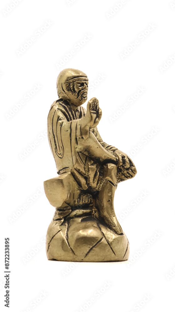 hindu saint sai baba guru golden statue isolated in a white background hindu saint sai baba guru golden statue isolated in a white background