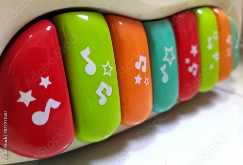Close-up of a colored musical keyboard toy.