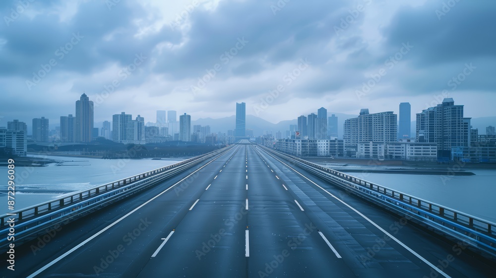 An empty highway stretching through the city An empty highway stretching through the city