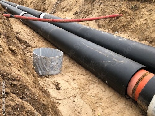 water pipes are laid in a dug trench