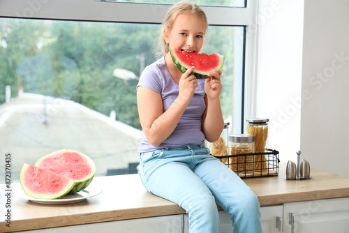 Little girl with fresh wate...