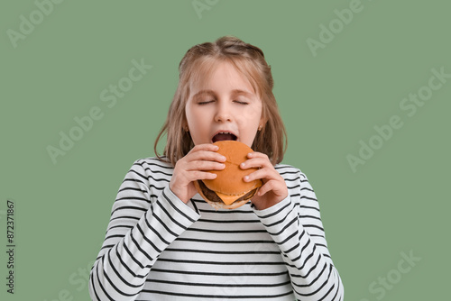 Cute little girl with burge...