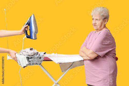 Displeased senior woman and...