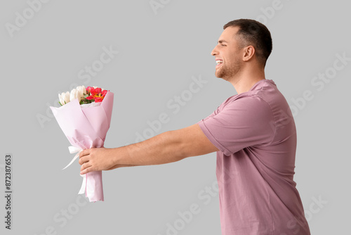 Handsome young happy man wi...