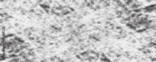 Grunge halftone gradient background. Faded grit noise texture. White and black sand wallpaper