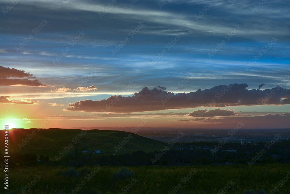 Obraz premium Sunsetting on a countryside Wyoming town 