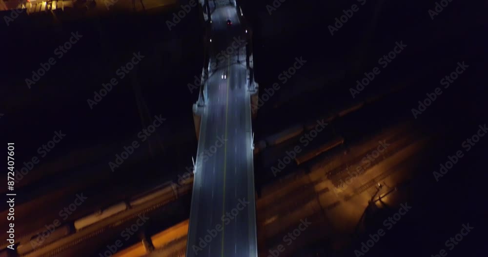 Aerial Forward Tilt Up Shot Of Illuminated Cars Moving On Viaduct Bridge By Modern Downtown District At Night - Los Angeles, California Aerial Forward Tilt Up Shot Of Illuminated Cars Moving On Viaduct Bridge By Modern Downtown District At Night - Los Angeles, California