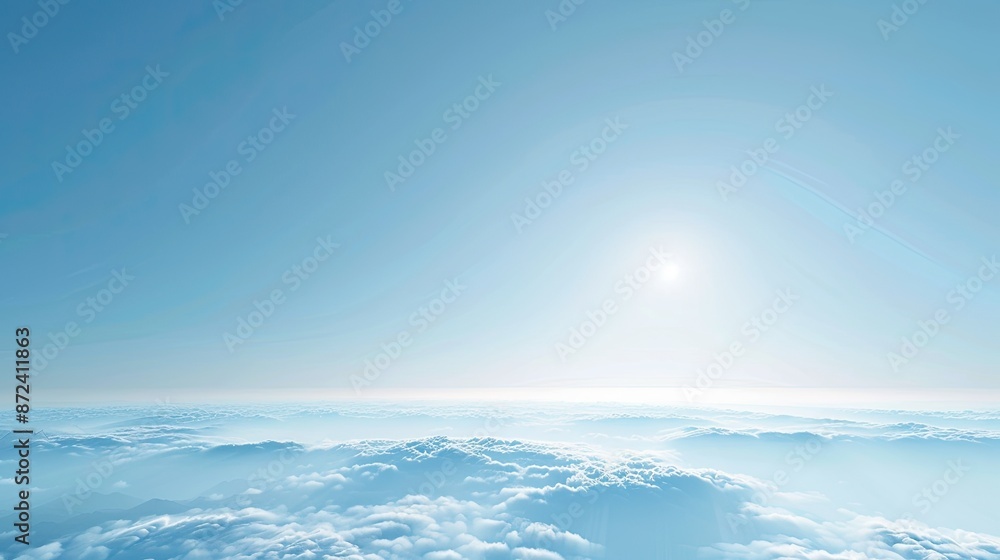 A blue sky with clouds and a sun in the middle. The sky is clear and bright, and the sun is shining brightly A blue sky with clouds and a sun in the middle. The sky is clear and bright, and the sun is shining brightly