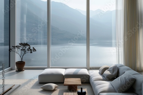 Luxury living room with panoramic window overlooking the lake.