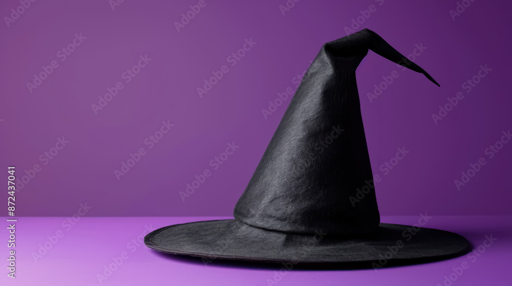minimalist witch's hat on a vibrant purple background minimalist witch's hat on a vibrant purple background