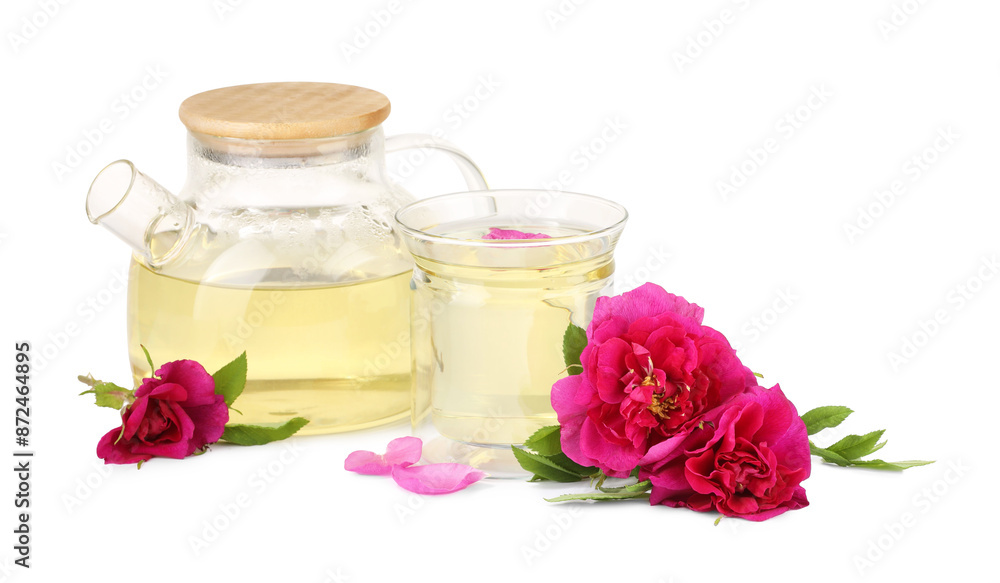 Aromatic herbal tea with rose flowers isolated on white Aromatic herbal tea with rose flowers isolated on white