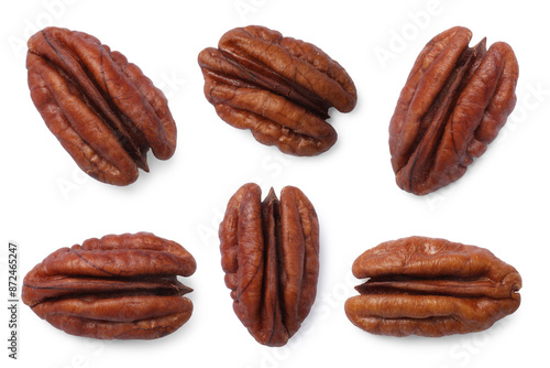 Many pecan nuts isolated on white, set