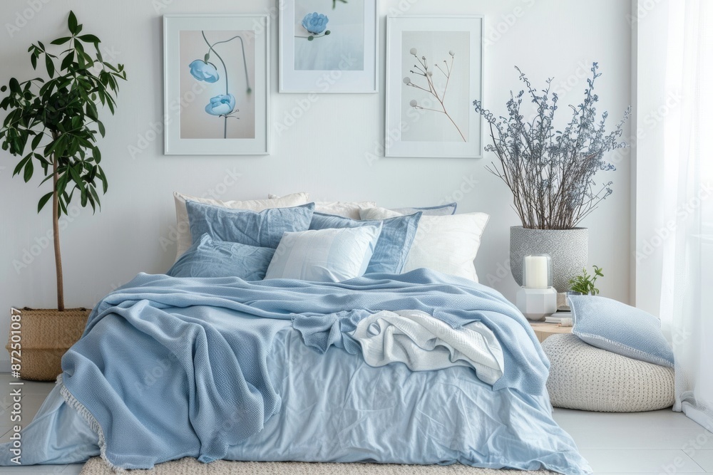 Blue and White Bedroom Interior with a Bed, Plant, and Decor Blue and White Bedroom Interior with a Bed, Plant, and Decor