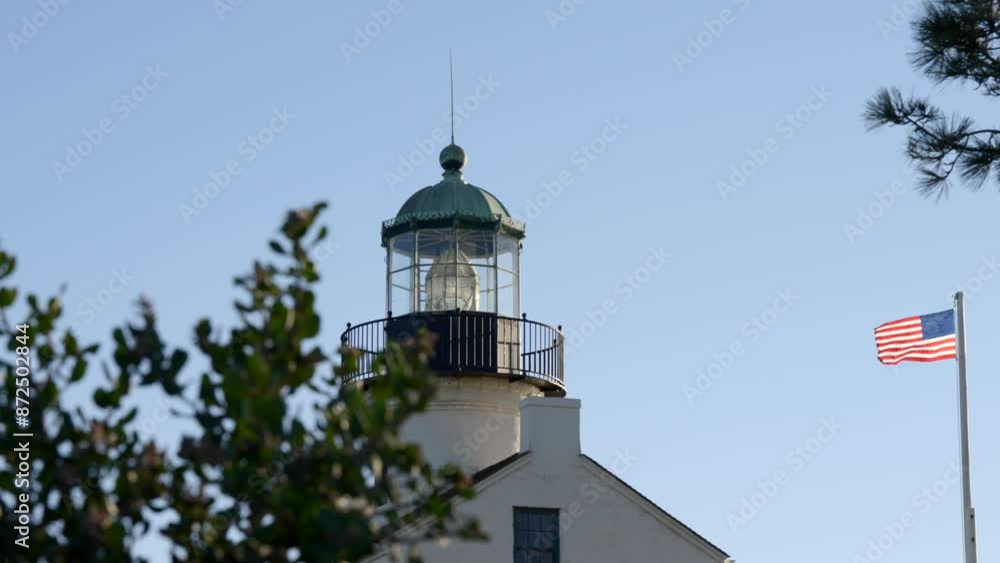 Lighthouse at Fort Rosecrans National Cemetery on a sunny day in San Diego California by the Pacific Ocean Lighthouse at Fort Rosecrans National Cemetery on a sunny day in San Diego California by the Pacific Ocean