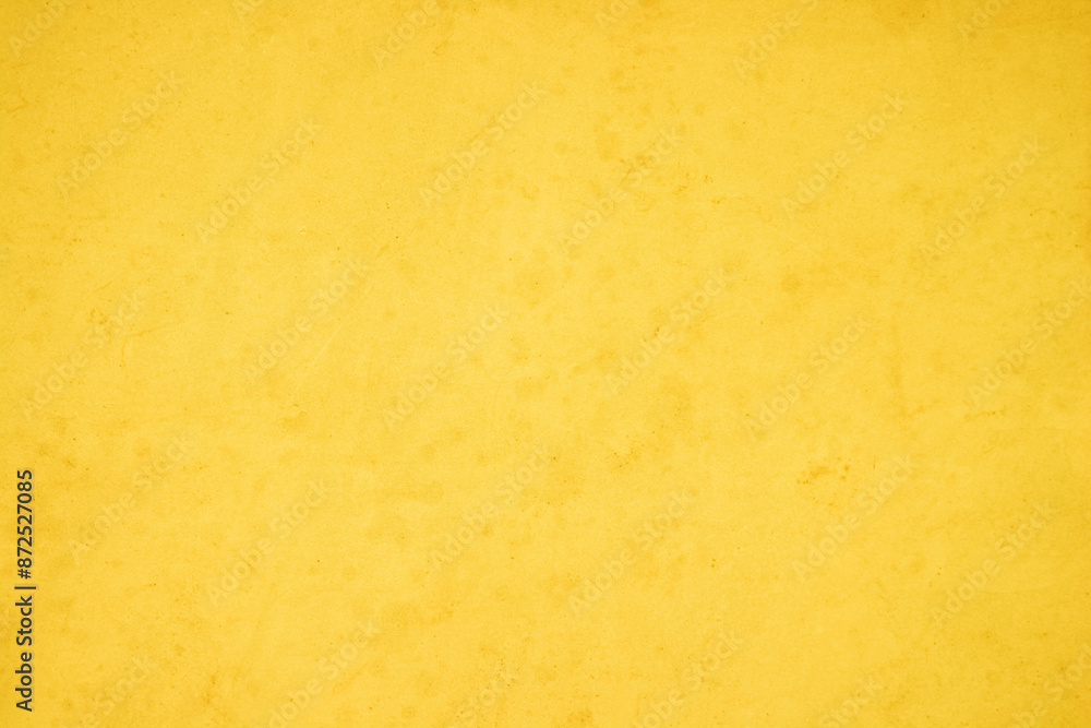 Yellow concrete stone texture for background in summer wallpaper. Cement and sand wall of tone vintage minimal. Concrete abstract wall of light yellow color, cement texture white blank for home decor. Yellow concrete stone texture for background in summer wallpaper. Cement and sand wall of tone vintage minimal. Concrete abstract wall of light yellow color, cement texture white blank for home decor.