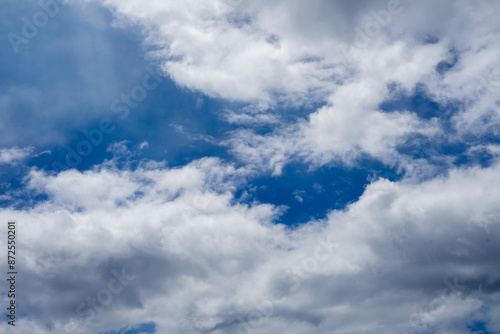 white clouds on a blue sky background