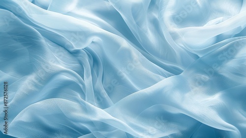 Light blue chiffon fabric texture with a soft and flowy feel photo