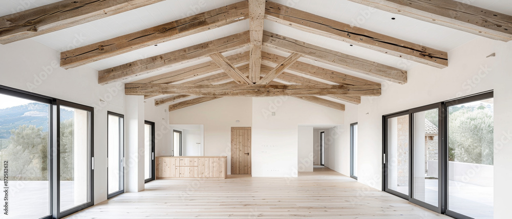Exposed rafters showcase stunning vaulted roof design in interior space. Exposed rafters showcase stunning vaulted roof design in interior space.