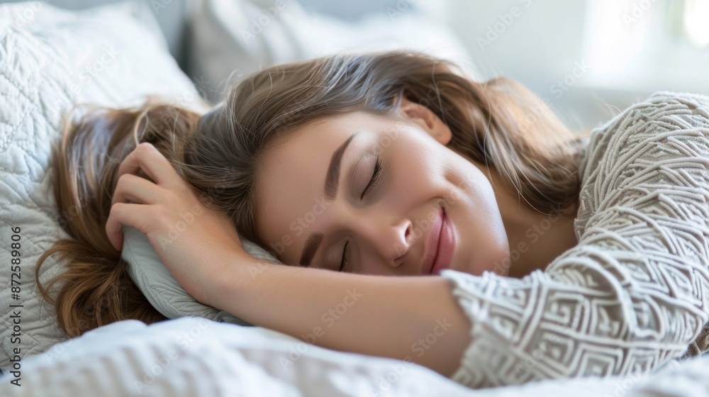 A young woman is sleeping soundly on the bed and smiling gently in a peaceful atmosphere. This image gives a feeling of relaxation and comfort. A young woman is sleeping soundly on the bed and smiling gently in a peaceful atmosphere. This image gives a feeling of relaxation and comfort.