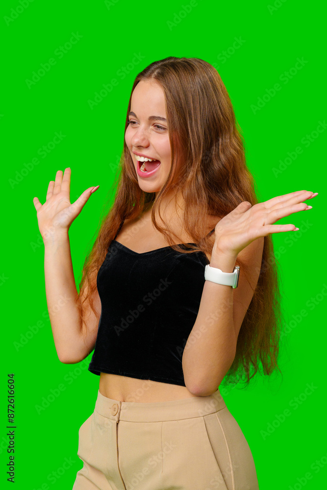 Woman Holding Hands Out in Front of Green Screen Woman Holding Hands Out in Front of Green Screen