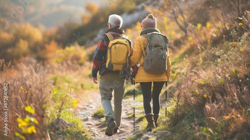 Retired couple enjoying outdoor activity hiking.  © kimly