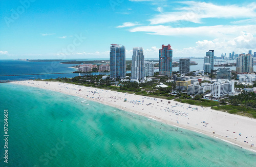 Aerial view of South Pointe Park. Miami Beach. Florida. USA. Weekend in Miami Beach. Aerial panoramic view of the city of Miami, buildings, marina, yachts and luxurious apartments. © Volodymyr