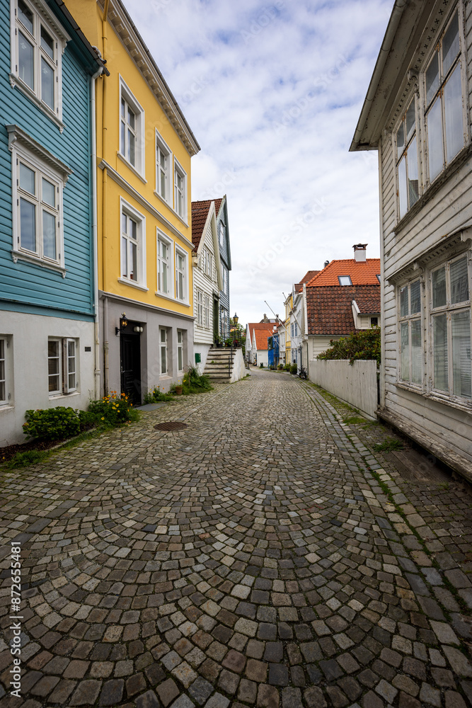 Peaceful old town street lined with cobblestones in Bergen, Norway