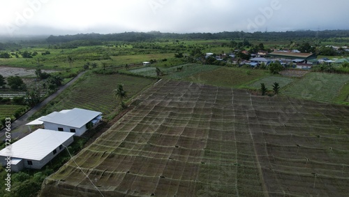 Kuching, Malaysia - July 4 2024: Aerial View of The Skuduk Paddy Field photo