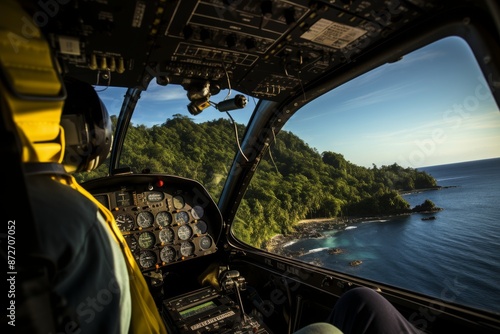 Helicopter soaring over stunning ocean landscape viewed from inside cabin window