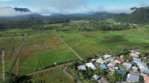 Kuching, Malaysia - July 4 2024: Aerial View of The Skuduk Paddy Field photo
