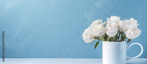 A light blue cup holds whit...