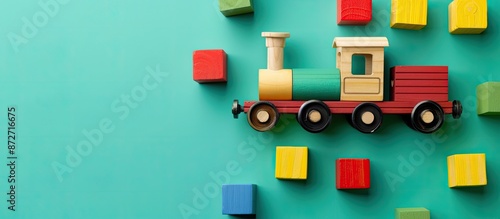 Wooden toy train surrounded...