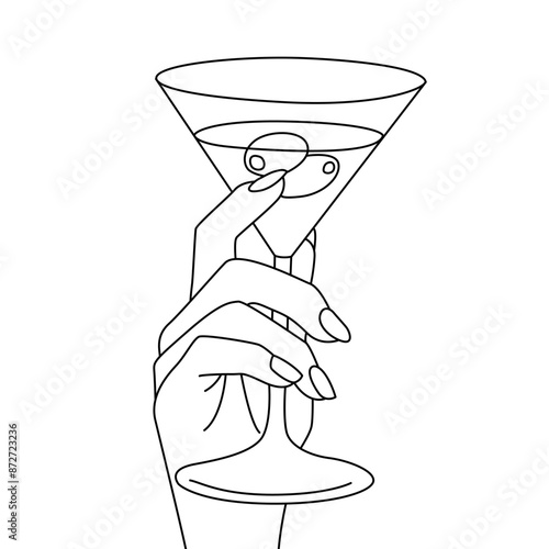 Hand holding a martini glass