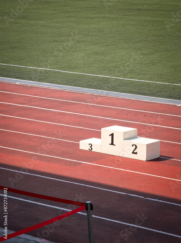 Sport podium inside a stadium. First, second and third placing for prize award ceremony.  photo