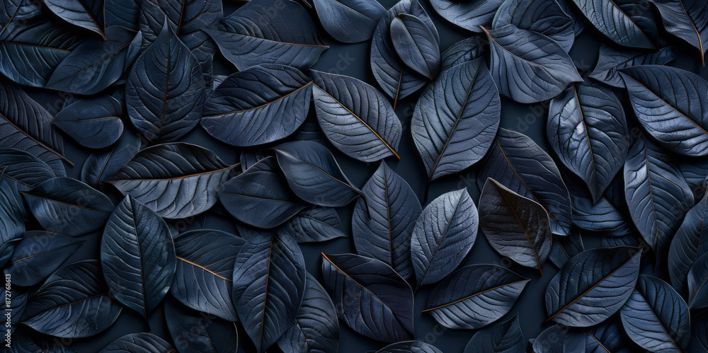 Dark background with abstract leaves in a wallpaper design. Dark background with abstract leaves in a wallpaper design.