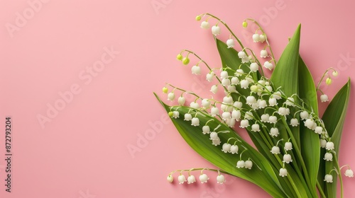 Lily of the valley bouquet on pink background Isolated with copy space