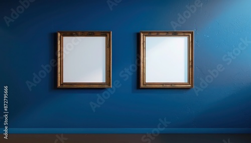 Avant-garde gallery mockup showcasing two bronze frames on a midnight blue wall.