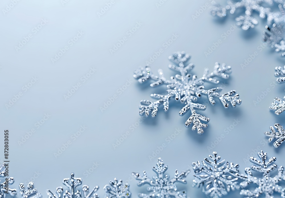 Silver Snowflakes on Light Blue Background Silver Snowflakes on Light Blue Background