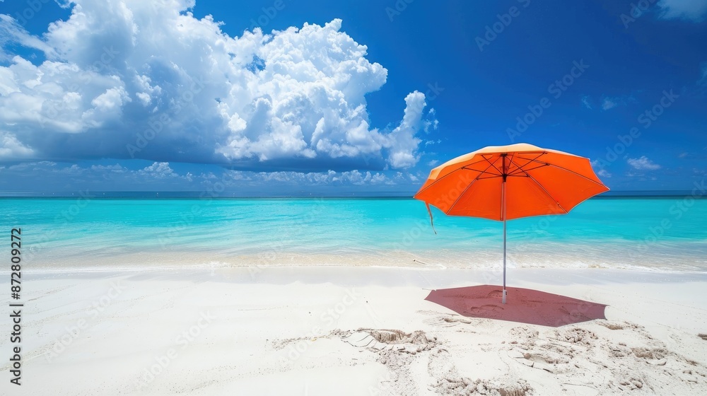 Sandy beach with white sand blue sky and umbrella Sandy beach with white sand blue sky and umbrella