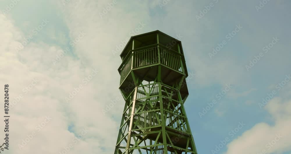 Lookout tower in Cheddar, England against a partly cloudy sky Lookout tower in Cheddar, England against a partly cloudy sky