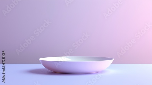 Image of vacant circular dish on purple backdrop