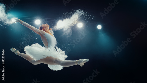 Wallpaper Mural Talented Ballet Dancing Ballerina in White Tutu Performs High Grand Jeté, With Powder Creating Dramatic Effect Under Bright Stage Lights, Her Grace, Strength, and Artistry. Torontodigital.ca