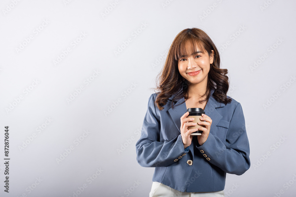 Portrait Asian beautiful happy young businesswoman standing smiling holding take away coffee paper cup, studio shot isolated on white background with copy space, coffee break Portrait Asian beautiful happy young businesswoman standing smiling holding take away coffee paper cup, studio shot isolated on white background with copy space, coffee break