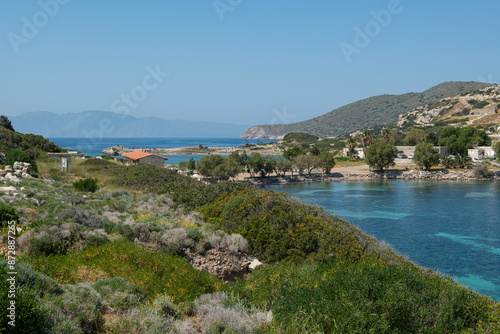 Knidos Ancient City in Datca Peninsula. Column ruins of Knidos Ancient City in Dat  a  Datca   Mu  la  Turkey. Beautiful Bay near Knidos Ancient City in Datca Peninsula.