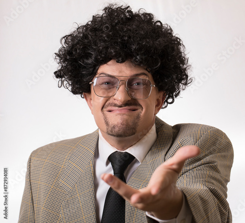 Male hand in a suit shows a palm up gesture  photo