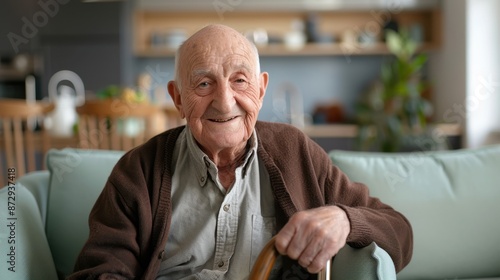 The elderly man sitting