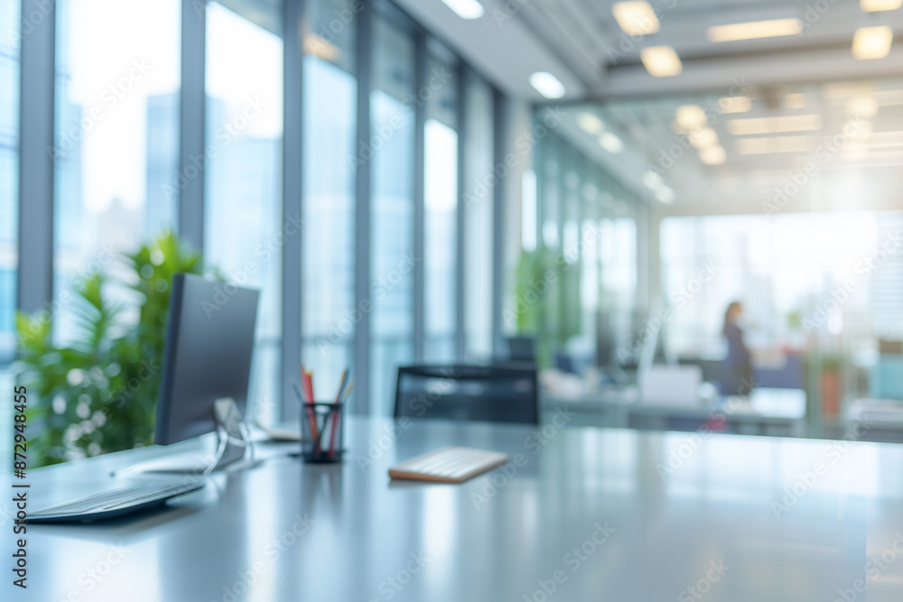 Clean, bright working desk with blurred office interior on background. Modern and luxury workspace Clean, bright working desk with blurred office interior on background. Modern and luxury workspace
