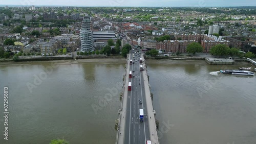 The drone aerial footage of Putney Bridge and Putney area of London, UK. Putney is an affluent district of south-west London, England, in the London Borough of Wandsworth. photo