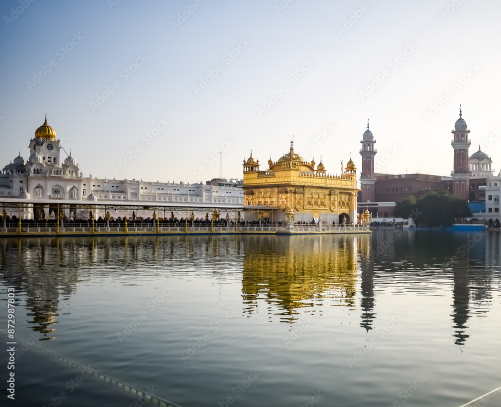 Fototapeta premium Beautiful view of Golden Temple - Harmandir Sahib in Amritsar, Punjab, India, Famous indian sikh landmark, Golden Temple, the main sanctuary of Sikhs in Amritsar, India